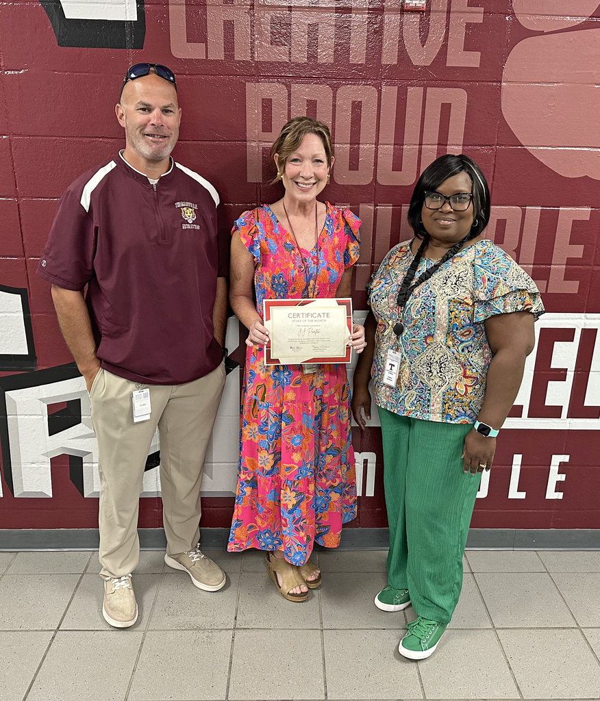 J.J. Parten, Special Education Teacher, and Andi Pate, Gifted Teacher, have been chosen as the "Staff Members of the Month" for August 2026 at Thomasville Middle School. Parten is pictured with Brad Elam, TMS Principal; and Renae Williams, TMS Assistant Principal.