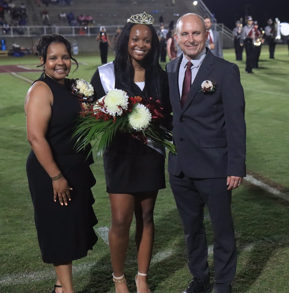 April Bouler, THS Principal; Kirstin Marshall, 2026 THS Homecoming Queen; and Jay Russell, THS Assistant Principal