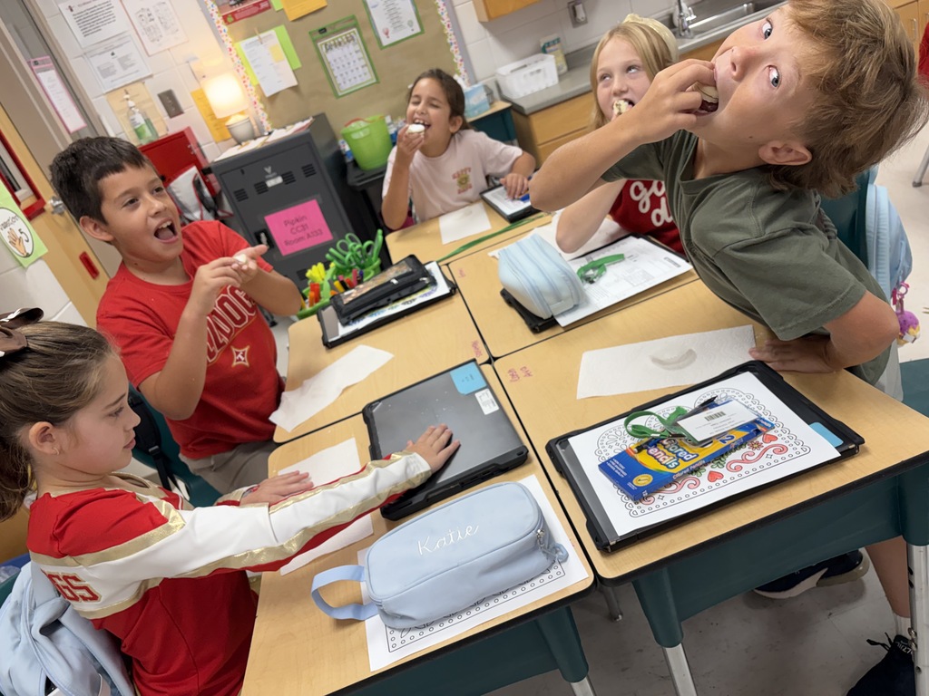 Mrs. Pipkin's class enjoying a homemade Spanish treat.