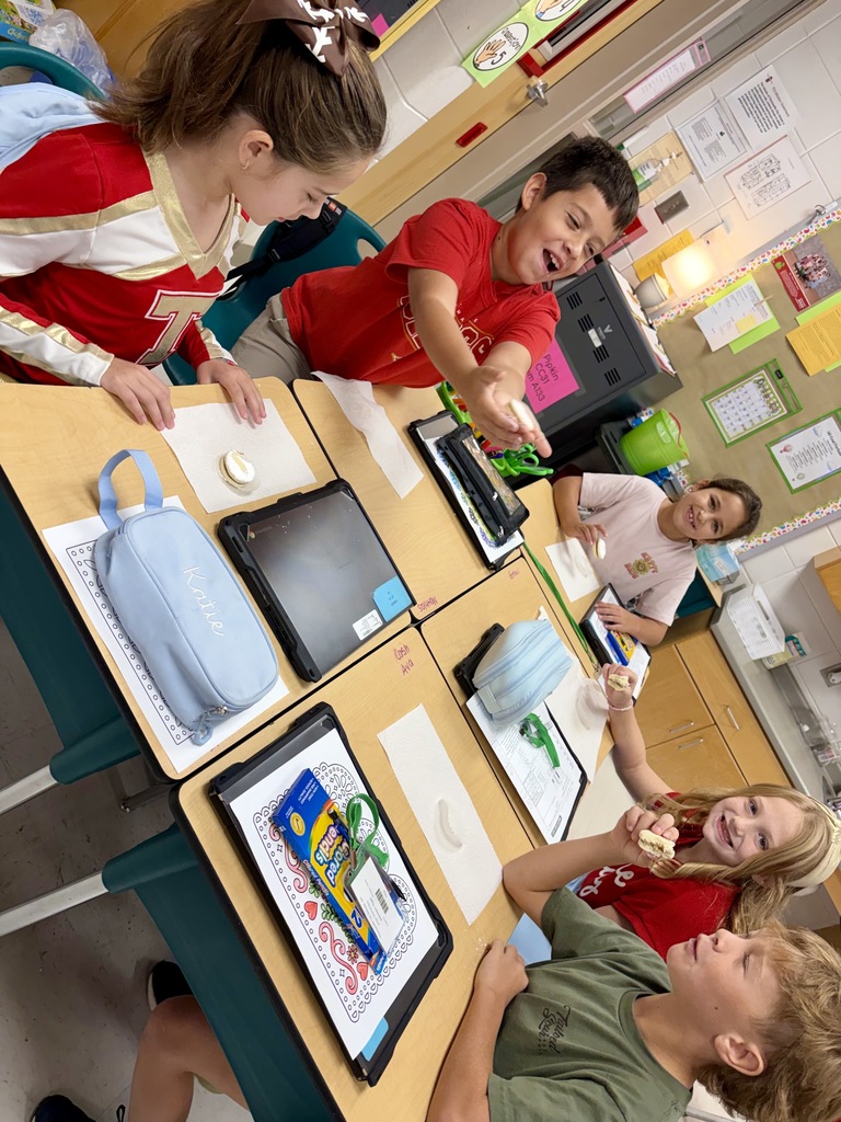 Mrs. Pipkin's class enjoying a homemade Spanish treat.