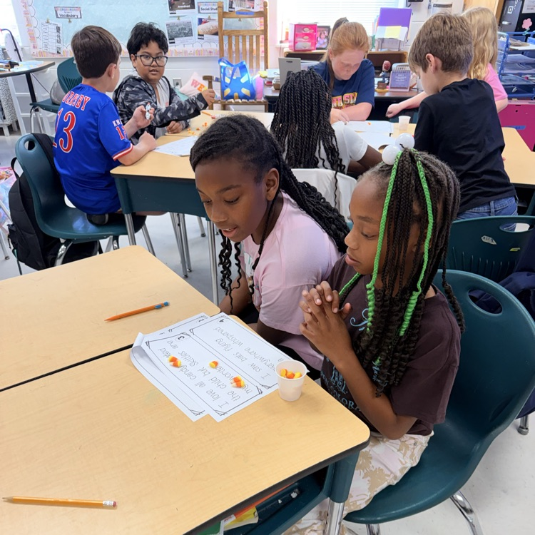 Ms. Kornegay's class using candy corn for Grammar 