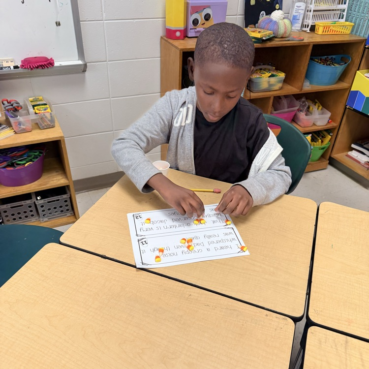 Ms. Kornegay's class using candy corn for Grammar 