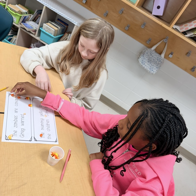 Ms. Kornegay's class using candy corn for Grammar 