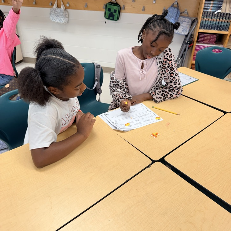 Ms. Kornegay's class using candy corn for Grammar 