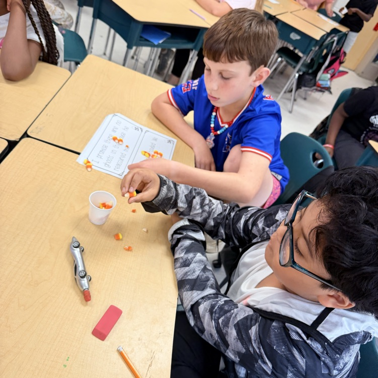 Ms. Kornegay's class using candy corn for Grammar 