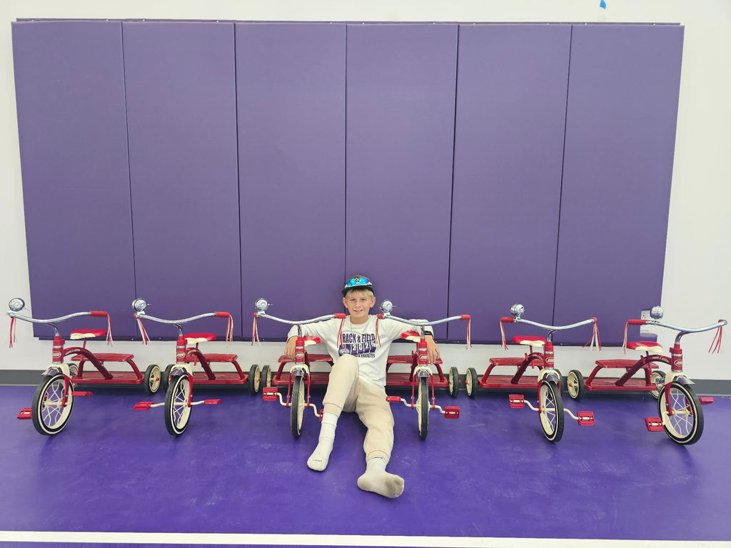 Landon with tricycles