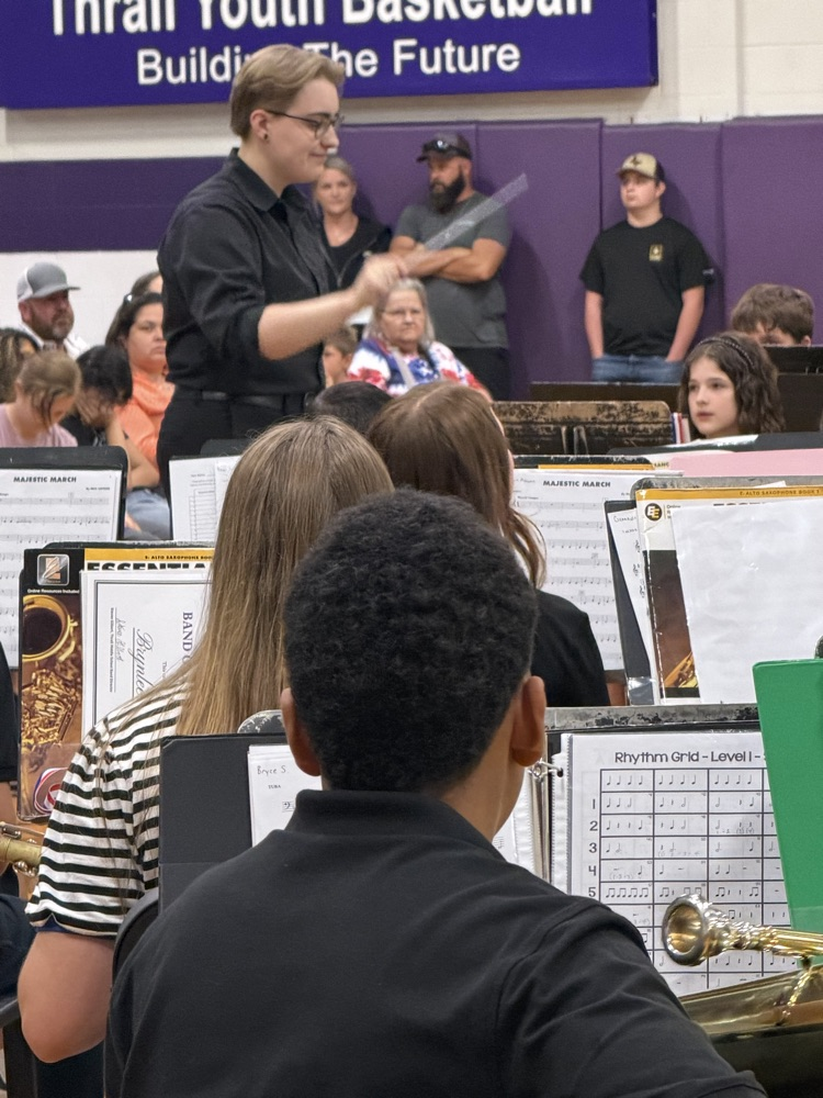 mS. Gilbert conducting 