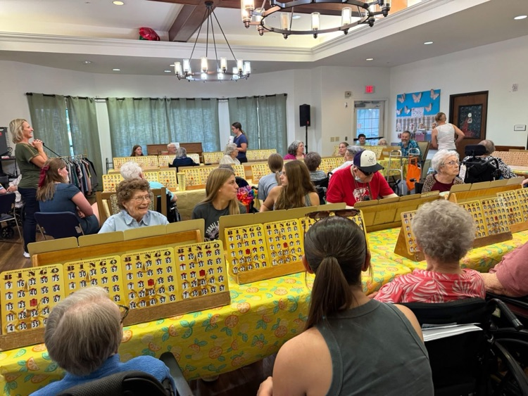 THS StuCo members playing Bingo with Taylor SPJST Skilled Nursing Facility residents.