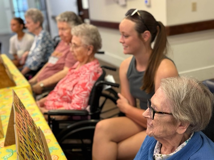 THS StuCo members playing Bingo with Taylor SPJST Skilled Nursing Facility residents.
