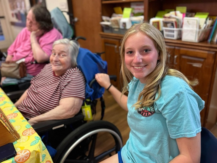 THS StuCo members playing Bingo with Taylor SPJST Skilled Nursing Facility residents.
