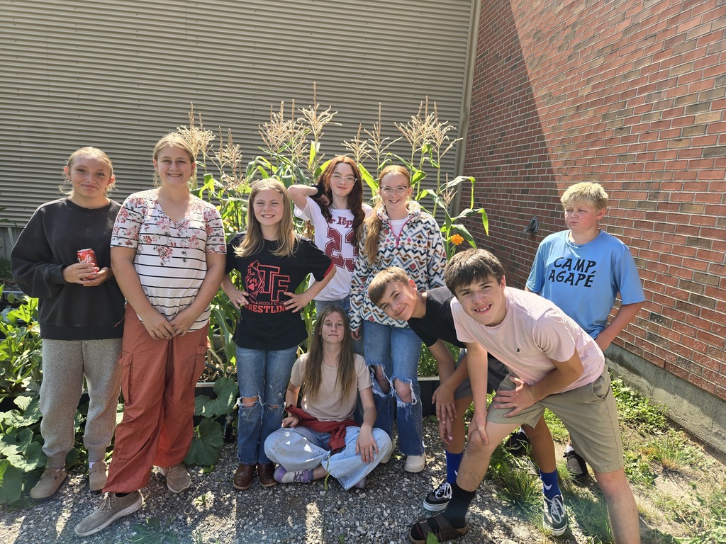 the corn is almost ready and tomatoes are turning red.