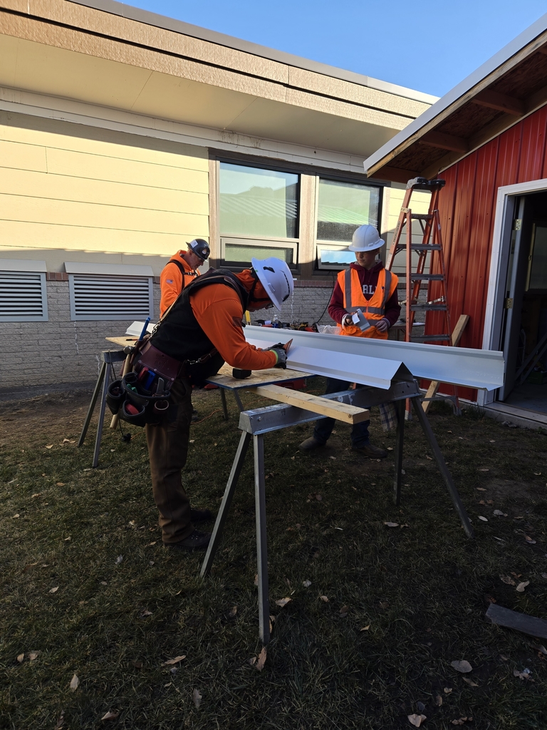 attaching thr roof, finishing the corners and our outdoor kitchen built with the assistance/guidance of the Education Department from Dick Anderson Construction.