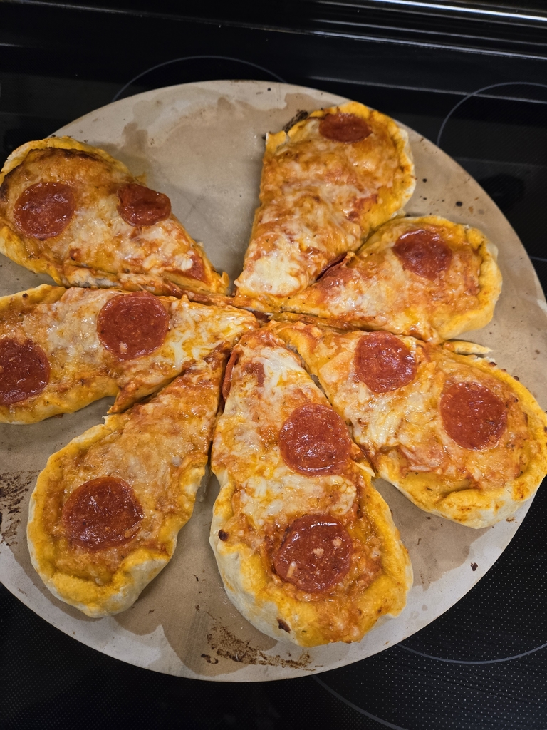 Creative pizza idea, no slicing necessary. Pull apart slices