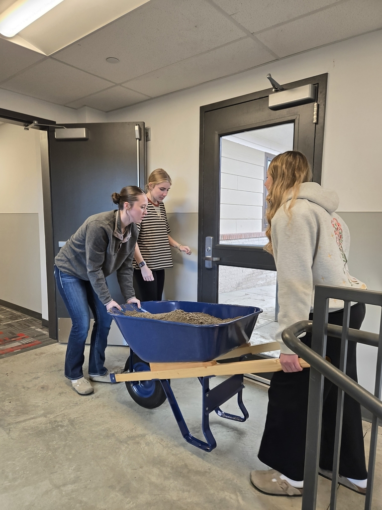 It takes teamwork to get the job done. We are excited to get the papers in place, thank you Mutual Materials for donating two pallets of RED pavers.