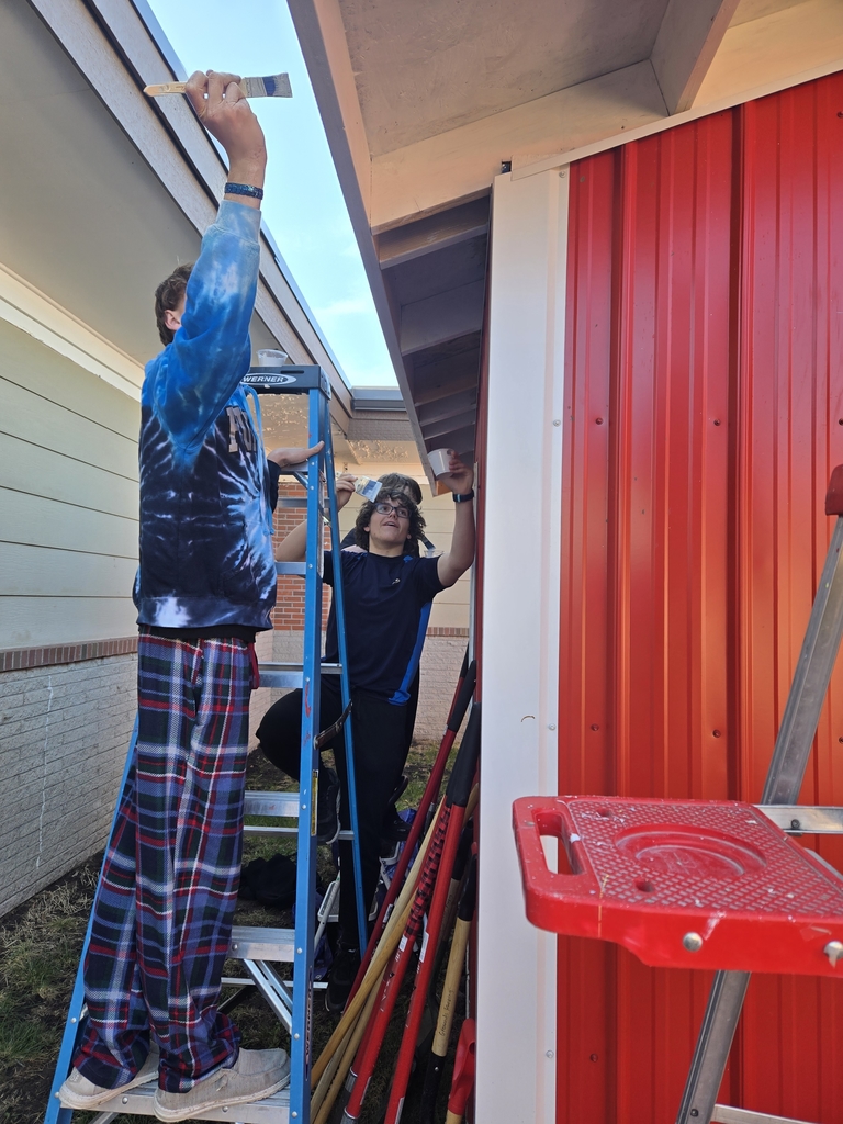 First coat of paint on the Little Red Shed