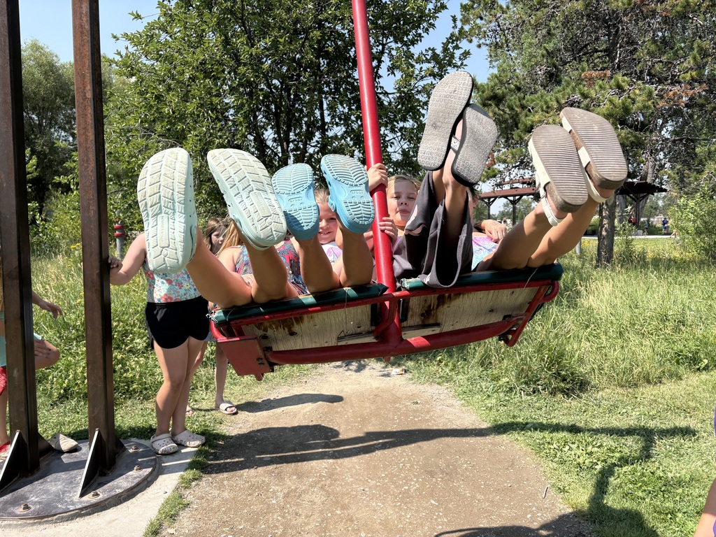 kids on a swing