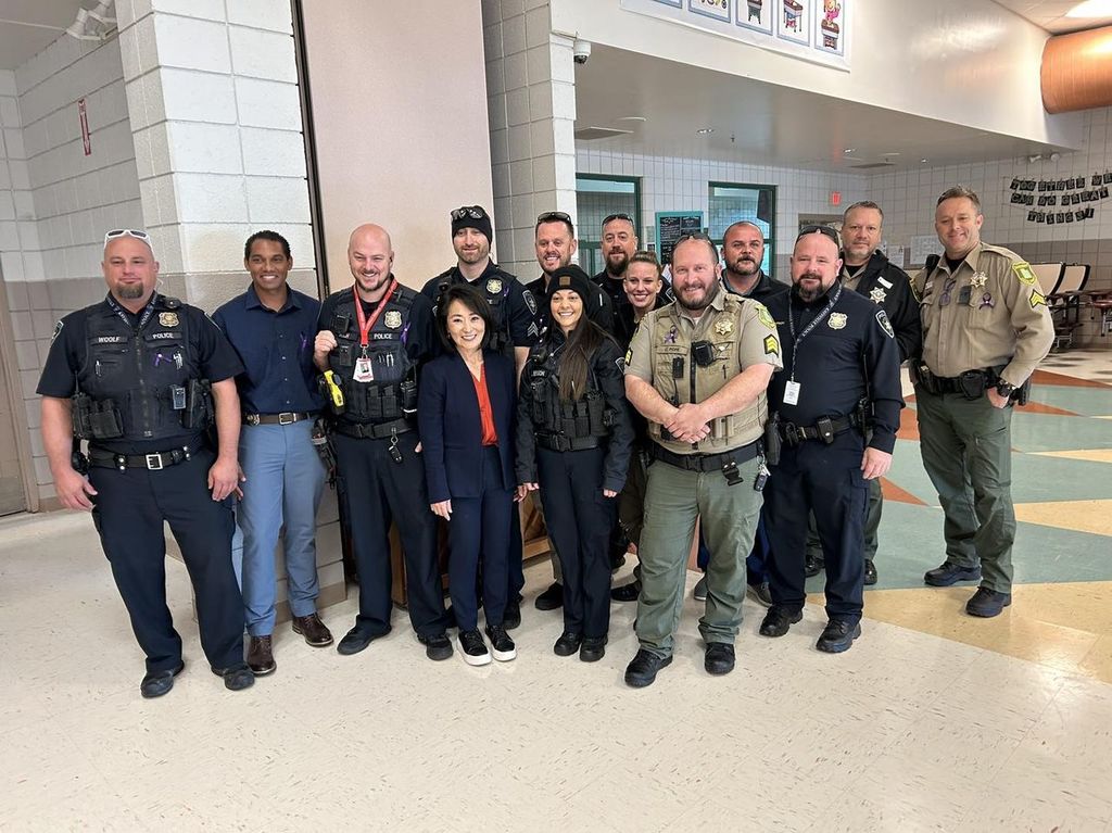 group of people with police officers