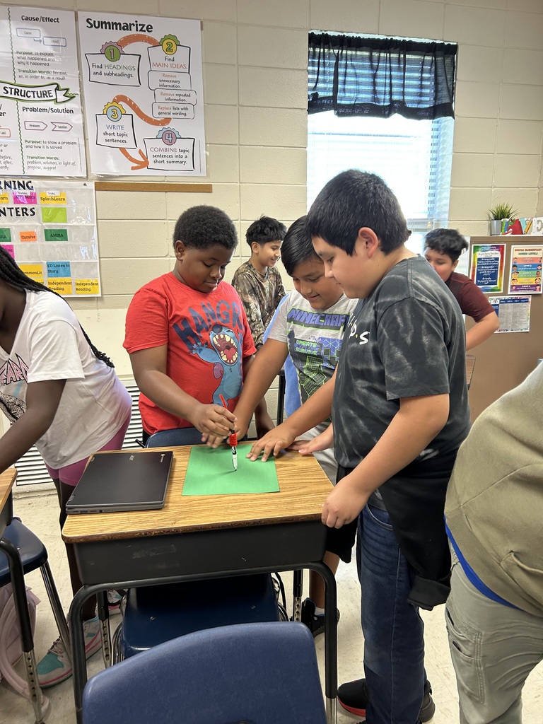 Students using seismographs.