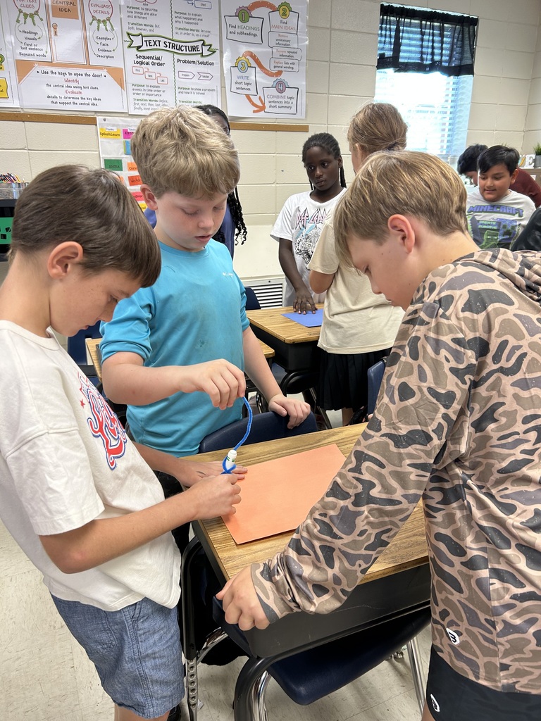Students using seismographs.
