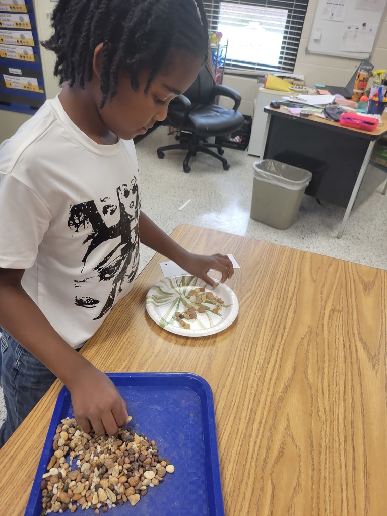 Students making rock shields.