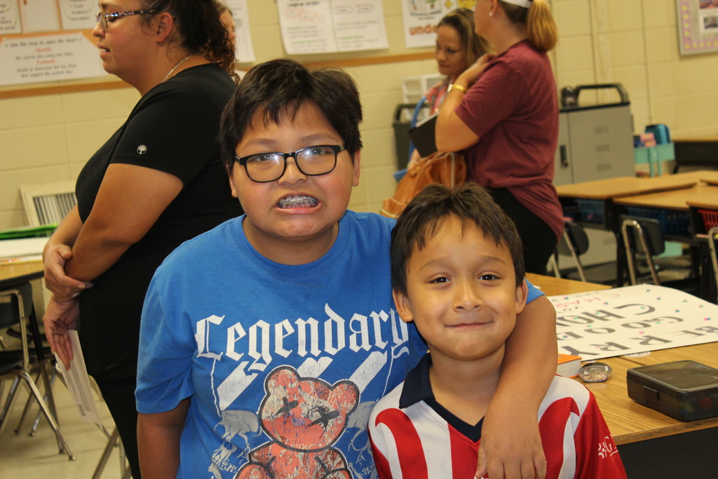 Parent, students,  and teachers at open house.
