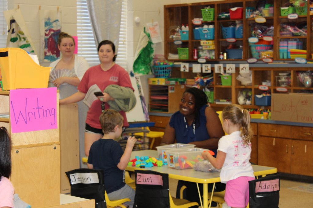 Parent, students,  and teachers at open house.