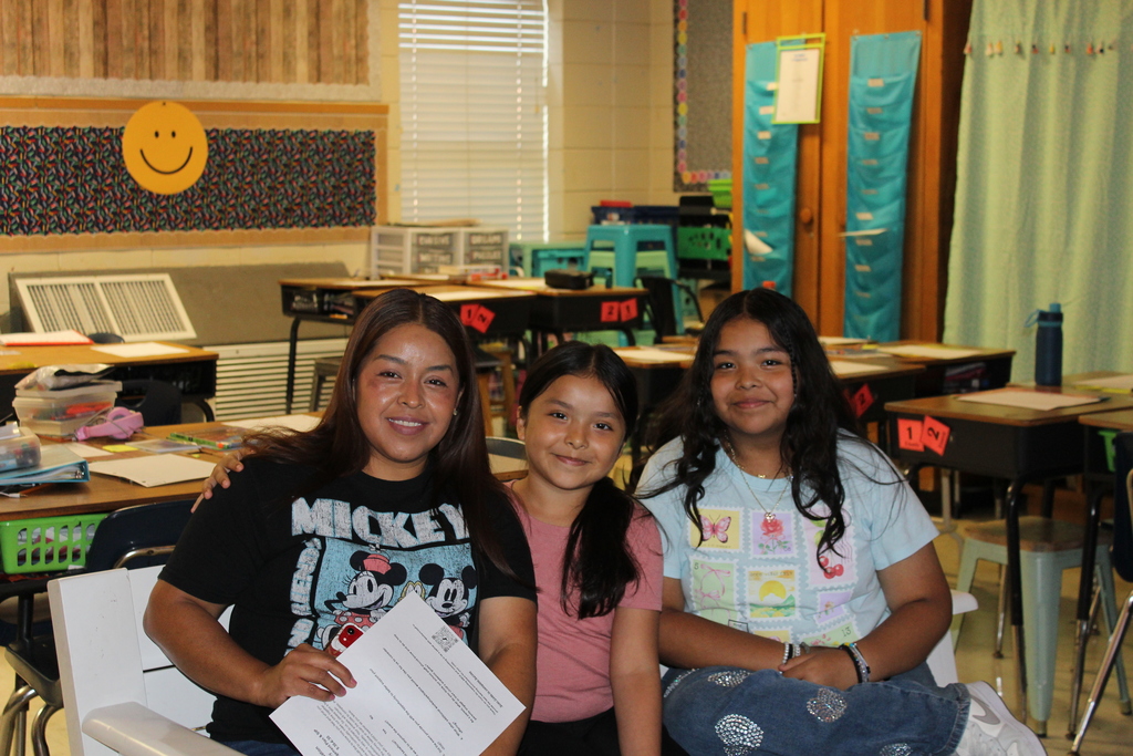 Parent, students,  and teachers at open house.