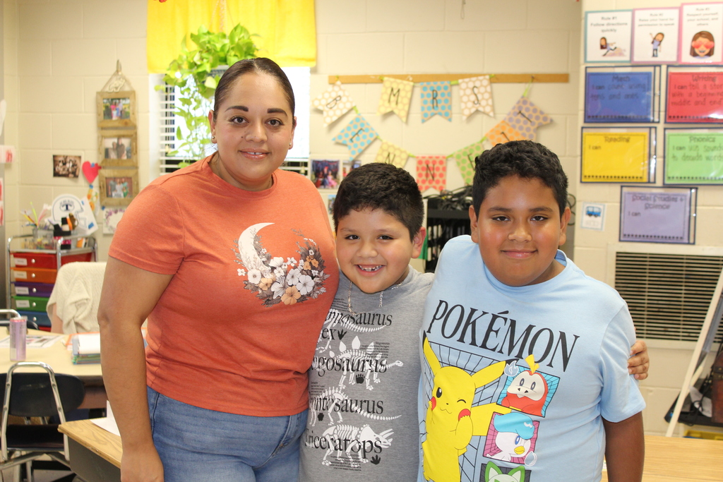 Parent, students,  and teachers at open house.