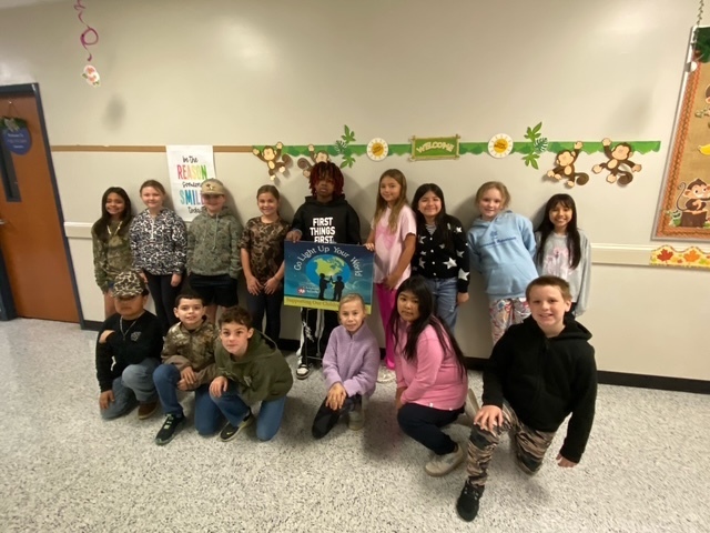 Student council members supporting the Go Light Up Your World Event.