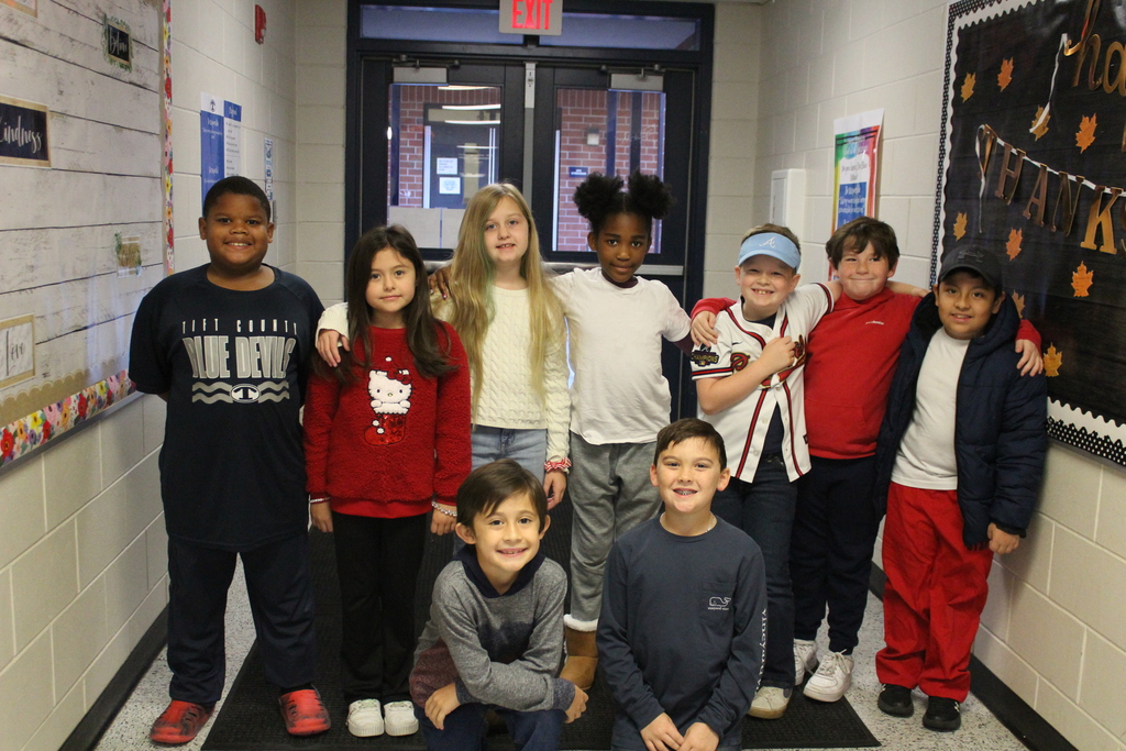 Students wearing red, white, and blue for Veterans Day.