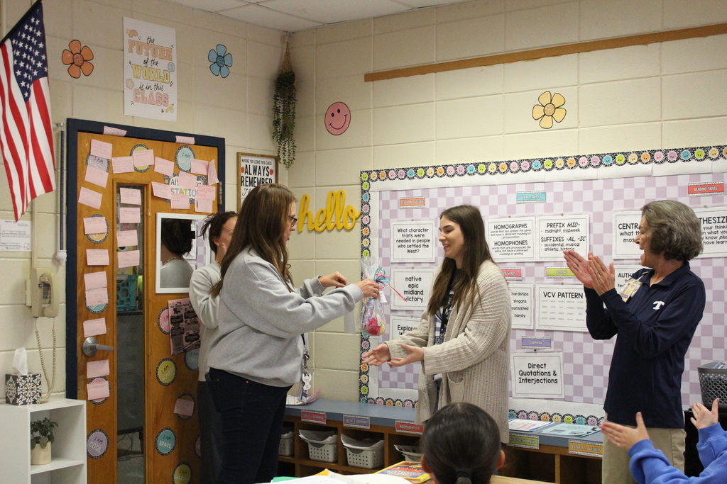 Ms. Sparks receiving the perfect attendance award. 