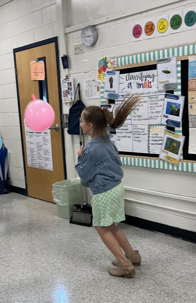 students engaged in forces and motion activity