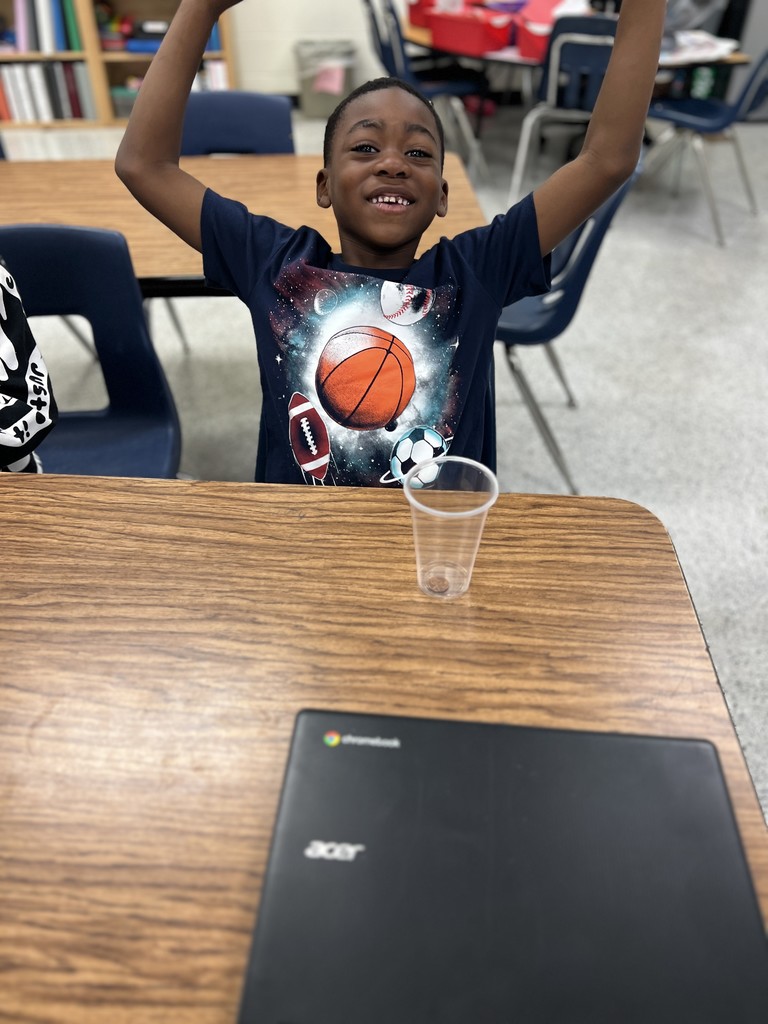 students engaged in forces and motion activity