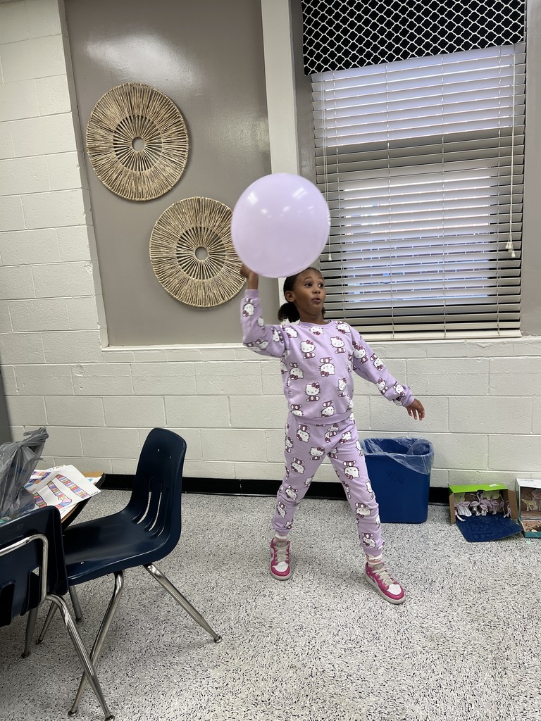 students engaged in forces and motion activity