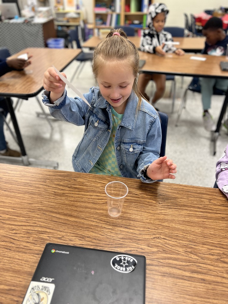 students engaged in forces and motion activity