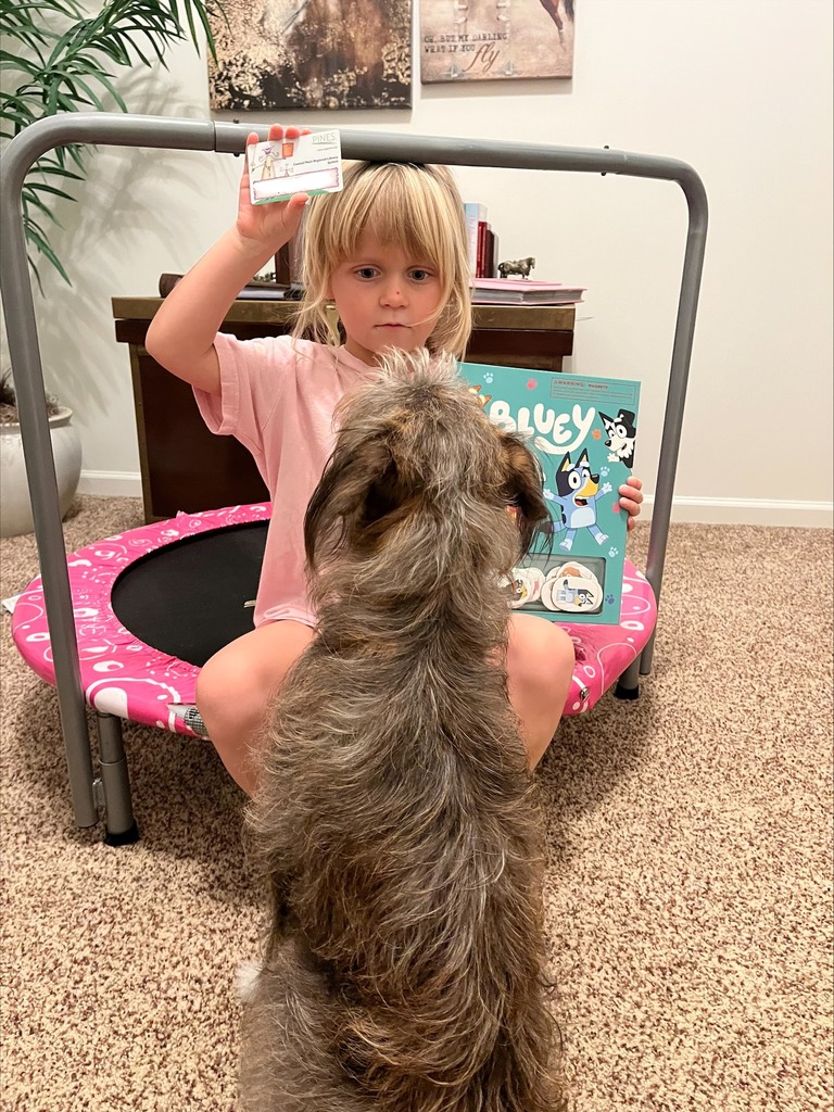 student with library card