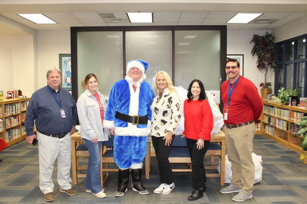 8th Street Middle School Santa's Blue Elves stop at Omega Elementary School