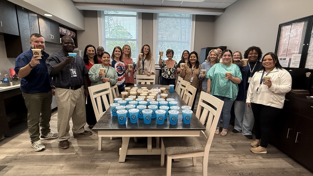 adults holding coffee and lemonade