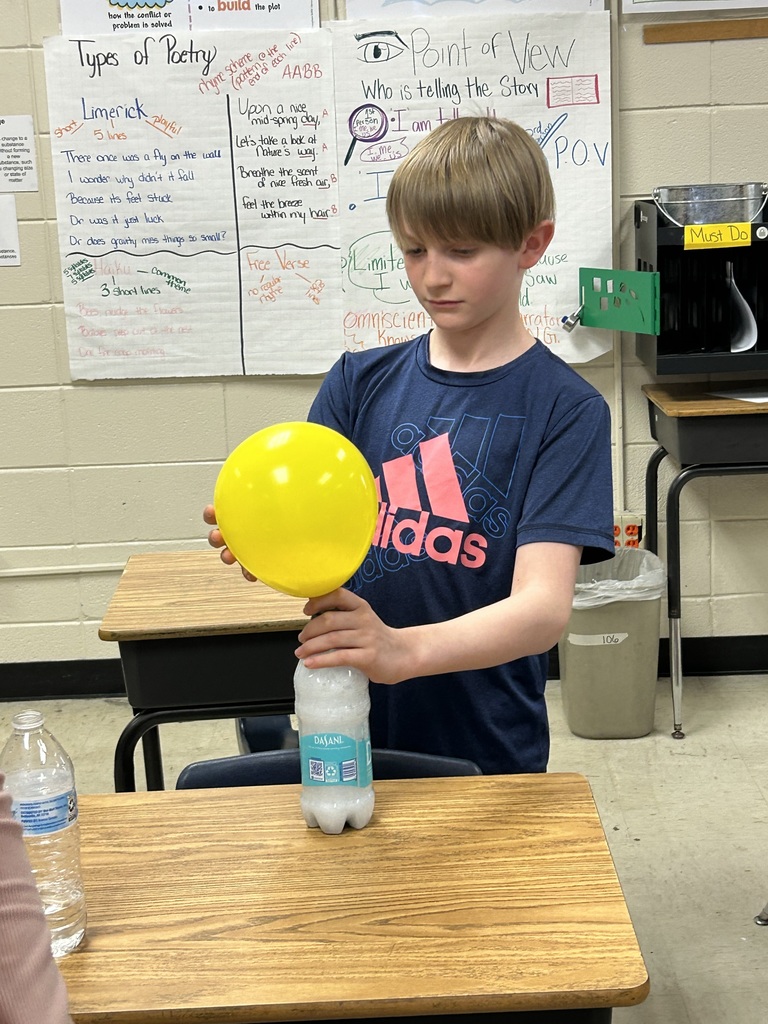 Mrs. Bennett's 5th graders completed a chemical reaction experiment. 