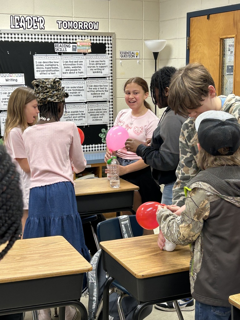 Mrs. Bennett's 5th graders completed a chemical reaction experiment. 