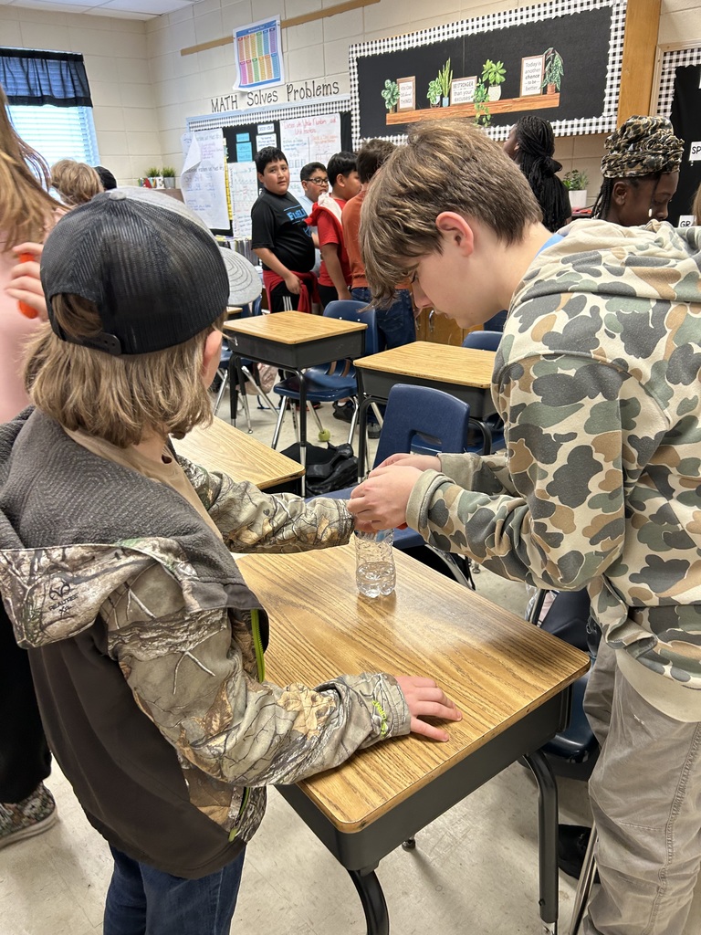 Mrs. Bennett's 5th graders completed a chemical reaction experiment. 