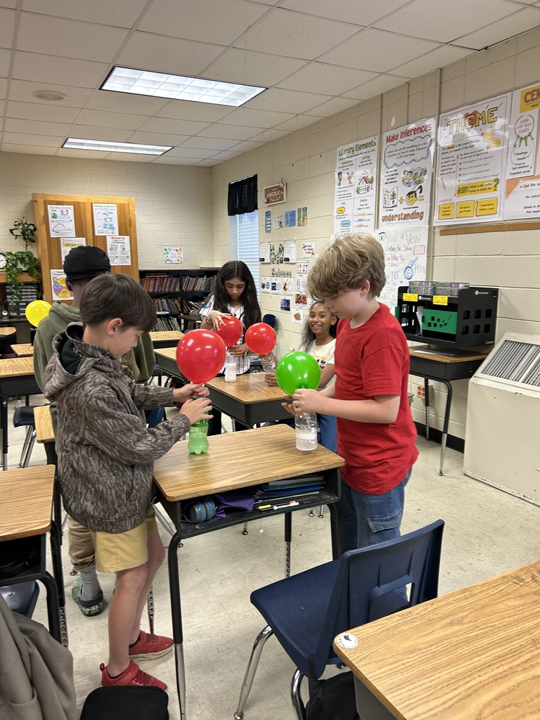 Mrs. Bennett's 5th graders completed a chemical reaction experiment. 