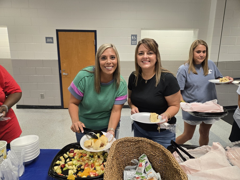 Teachers enjoying breakfast from our PTO