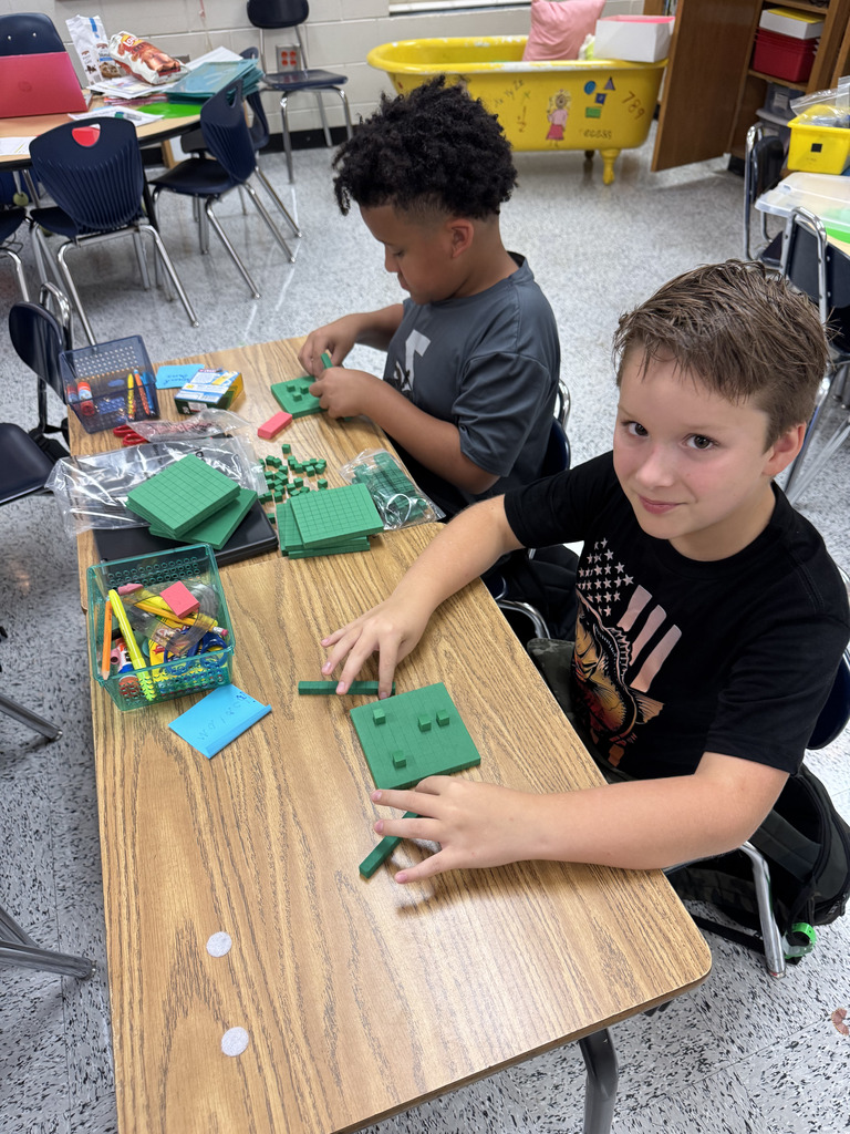 3rd grade students combining place value and creativity. 