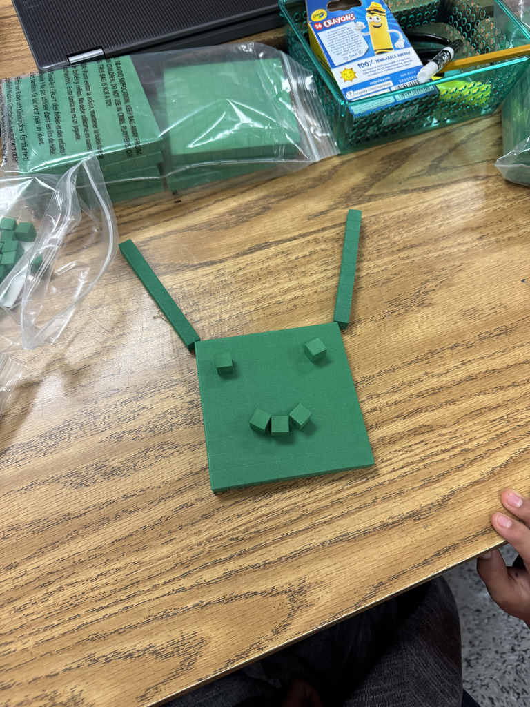 3rd grade students combining place value and creativity. 