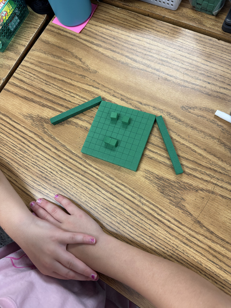 3rd grade students combining place value and creativity. 