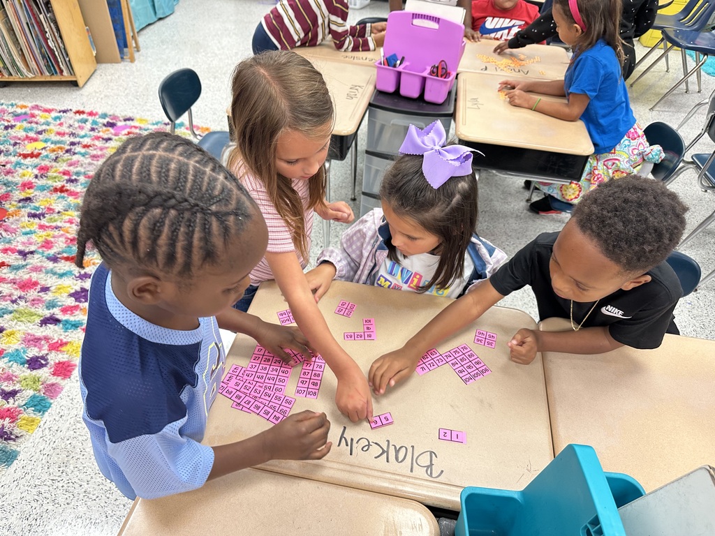 Students in Ms. Parker’s class are learning about place value and counting forwards/backwards within 120! Each group was given a 120 chart that had been cut in different pieces. They had to work together as a team to put the chart back together!