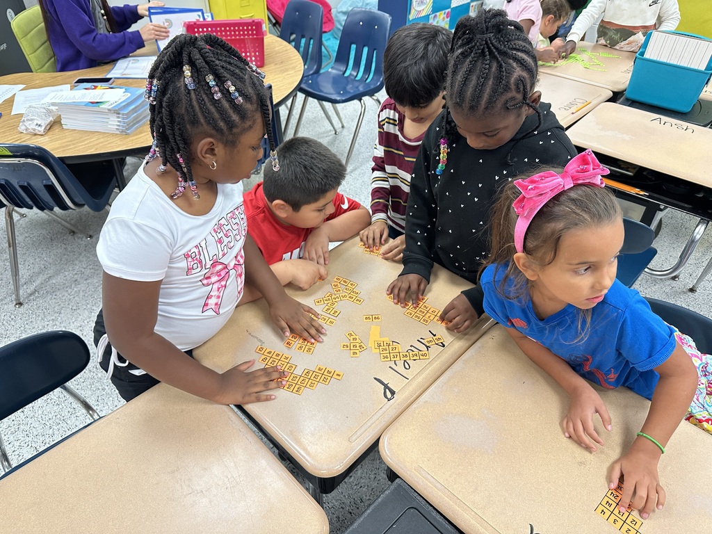 Students in Ms. Parker’s class are learning about place value and counting forwards/backwards within 120! Each group was given a 120 chart that had been cut in different pieces. They had to work together as a team to put the chart back together!