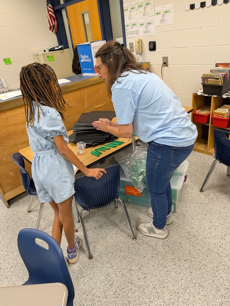 Mrs. Pritchett's class practices their place value skills.