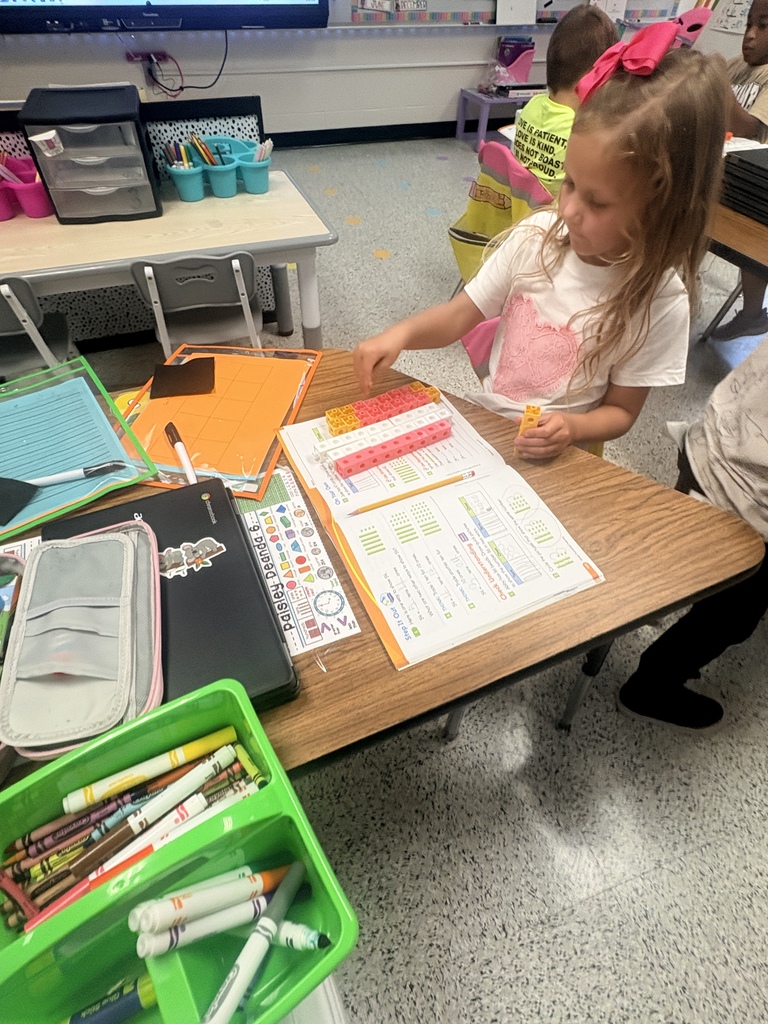 Mrs. Deanda's first graders are learning about place value.